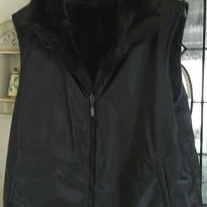 Fur (faux) reversible vest.